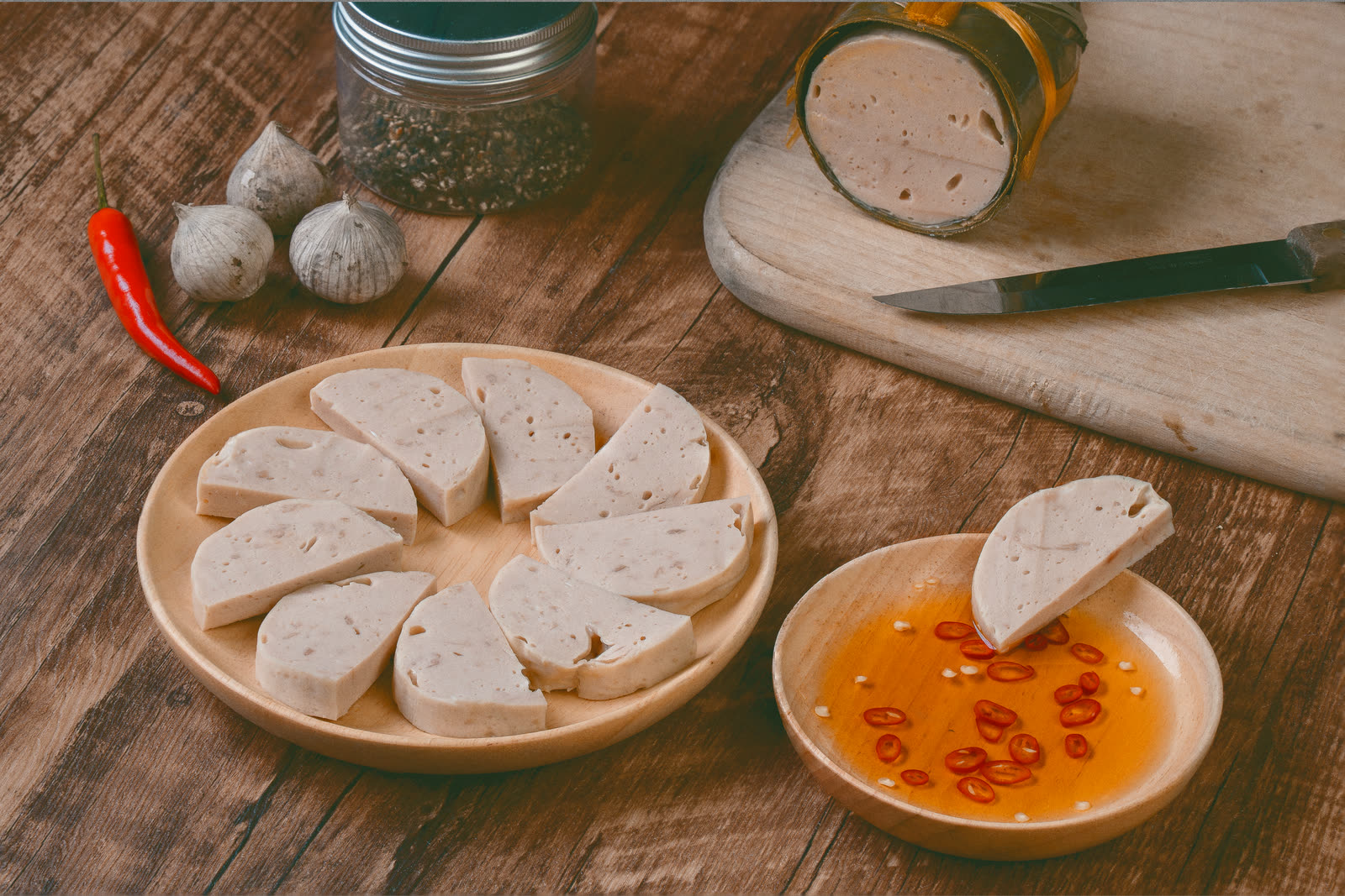 Sliced Vietnamese pork roll with chilli fish sauce